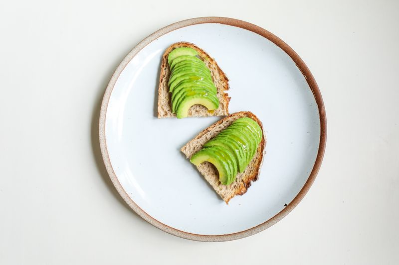 Tatte avocado toast with poached egg and microgreens