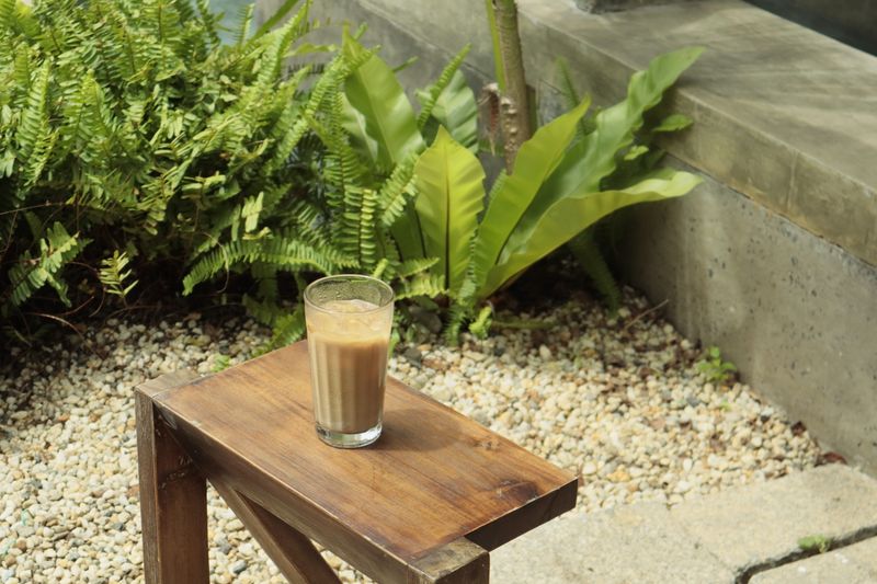 Tatte cold brew coffee with ice over glass